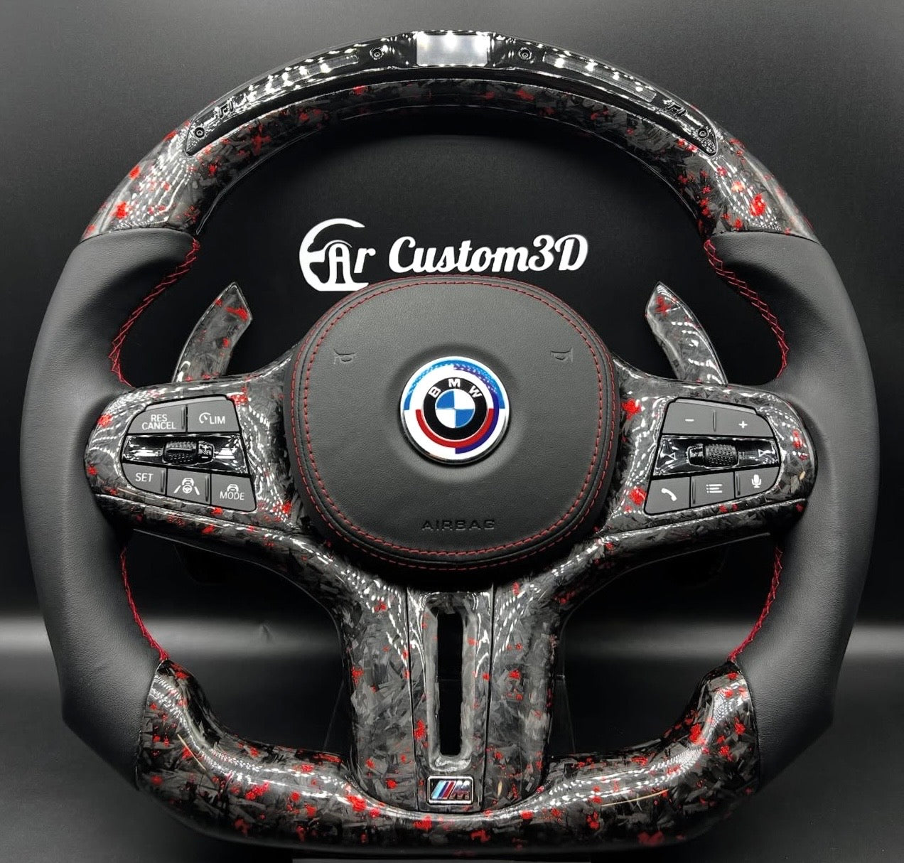 volant bmx serie g en carbone forgé rouge cuir lisse leds garniture centrale carbone forgé rouge logo m couvercle d'airbag cuir lisse surpiqûre rouge