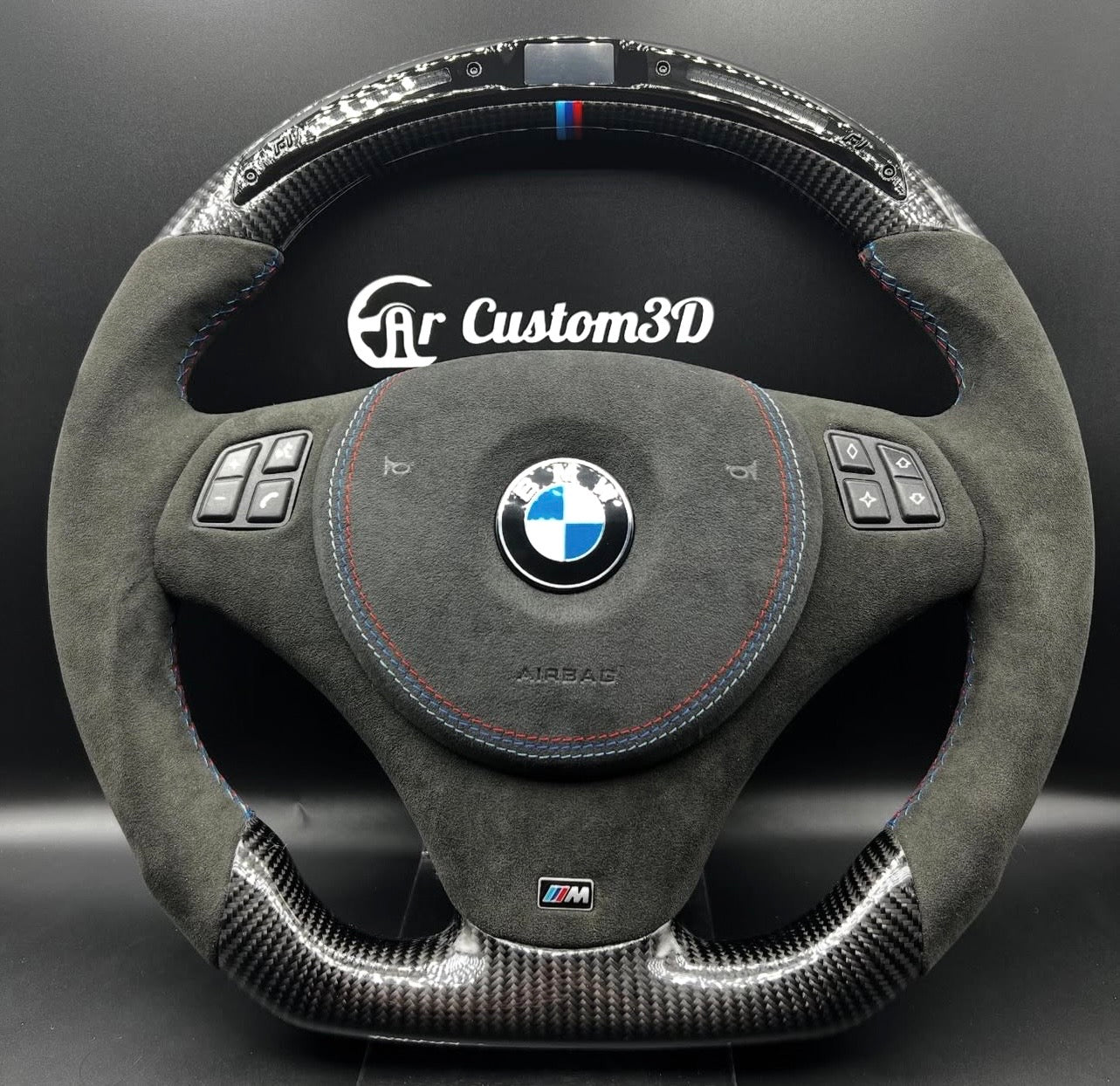volant bmw serie e9x en carbon alcantara surpiqûre m avec leds garniture centrale en alcantara avec logo m couvercle d'airbag en alcantara surpiqûre m